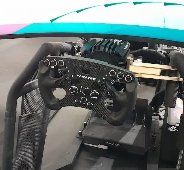 Fanatec ClubSport Formula V2.5 sim racing wheel rim attached to the PlayStation compatible GT DD Pro wheel base.