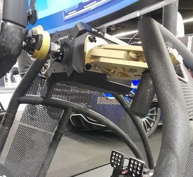 Fanatec DD2 direct drive sim racing wheel base mounted to a Rennsport V2 cockpit and attached to a Podium M4 GT3 wheel rim.