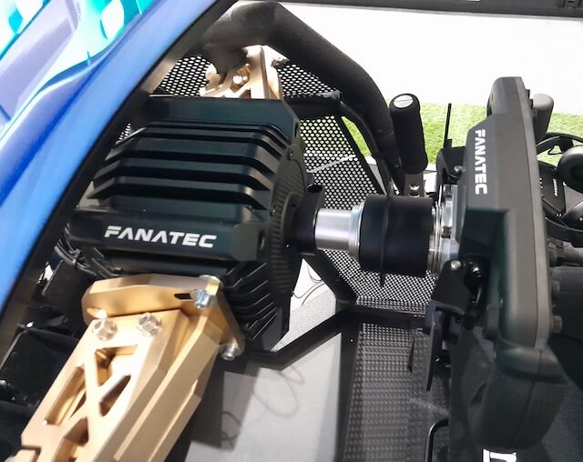 Fanatec CSL GT DD Pro sim racing wheel base connected to the Fanatec ClubSport Formula racing wheel rim and mounted to a cockpit using the Podium Brackets.