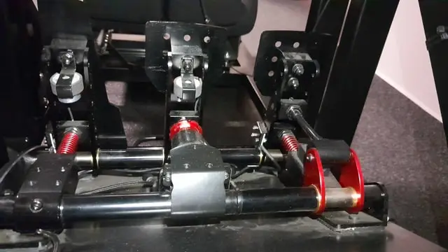 Rear of the Fanatec ClubSport V3 sim racing pedals showing the vibration motors on the clutch and accelerator pedals.