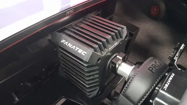 Fanatec CSL DD sim racing wheel base mounted to a rig with a Fanatec wheel rim attached.