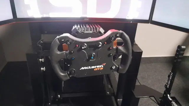 Fanatec CSL Elite McLaren GT3 V2 sim racing wheel attached to a CSL DD wheel base.